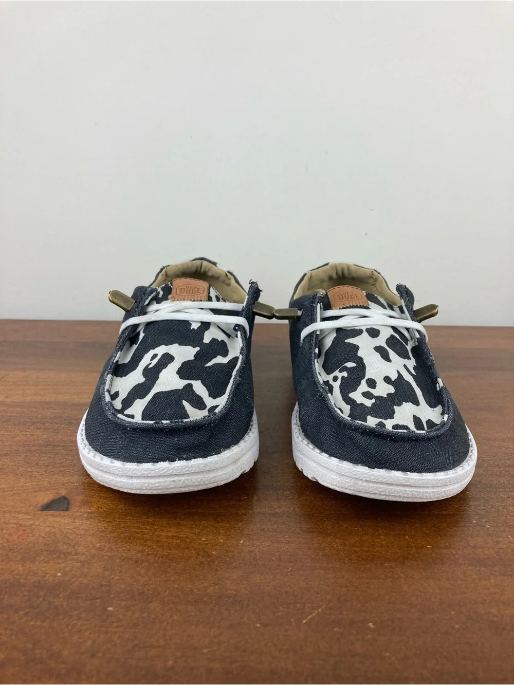 Hey Dude Wendy Animal Black Cow Print Slip-On Shoes 41037-0HO Women's Size 6.